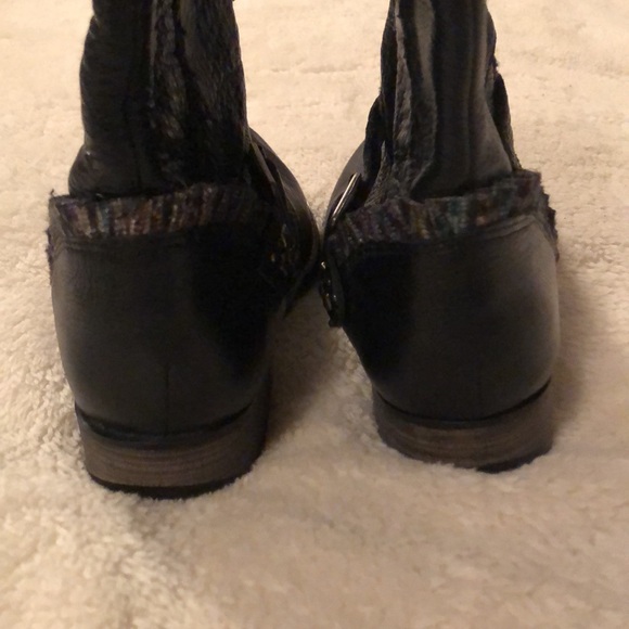 Black Kenzie leather boots with buckles, stud, and ruffle details - Picture 4 of 13